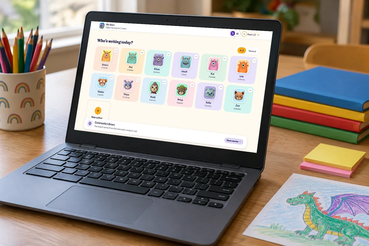 A Chromebook on a classroom table showing My Story's author screen, with a card for each student author in the class